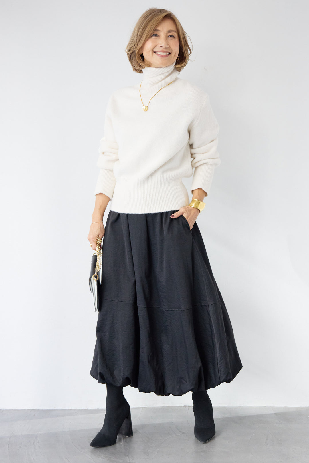 ライトウォームタートルネックニット