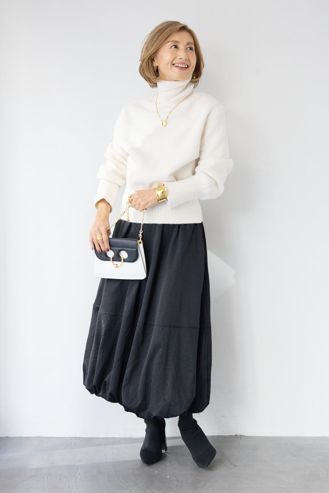 ライトウォームタートルネックニット