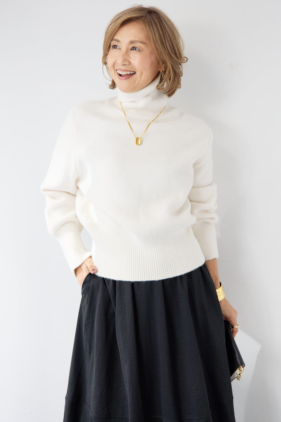 ライトウォームタートルネックニット