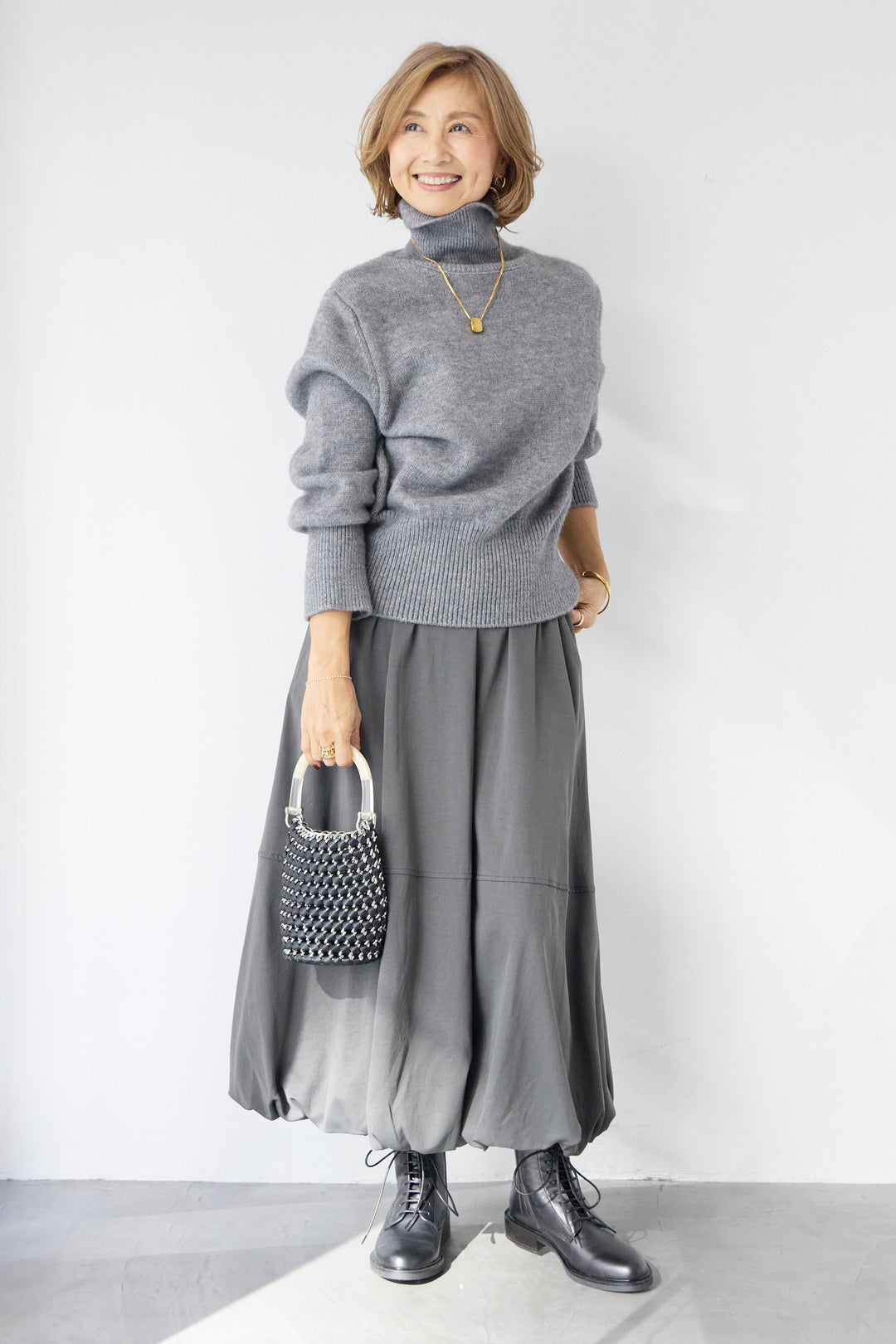 ライトウォームタートルネックニット