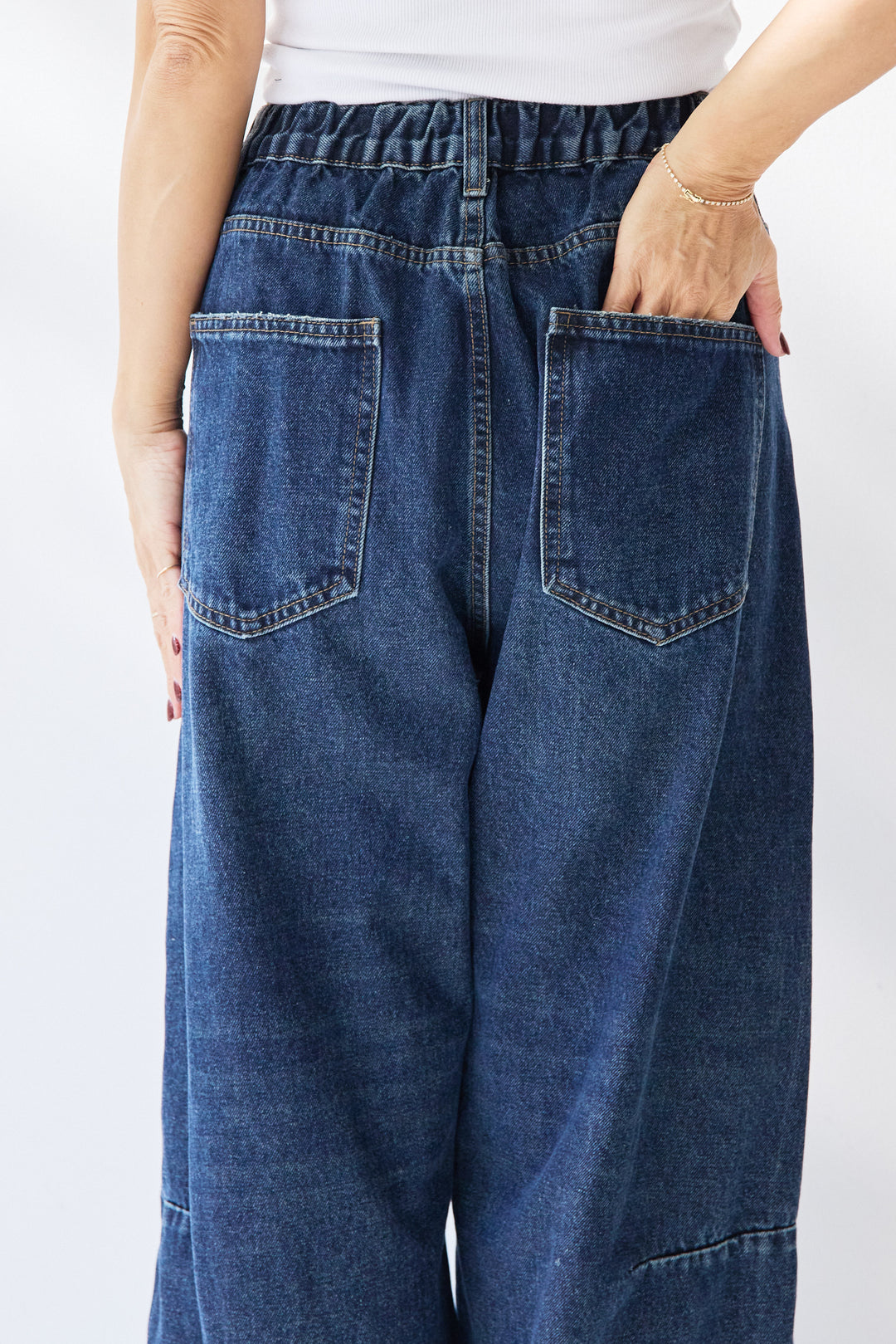 カーブデニムパンツ