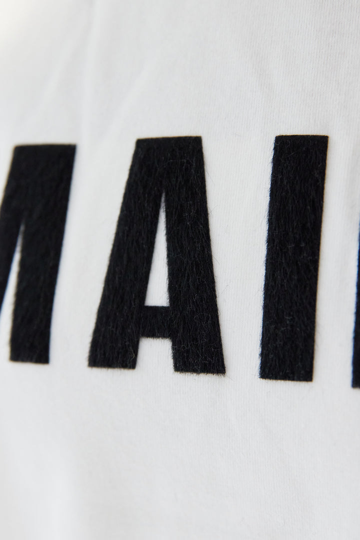 MAIRE フロッキーロゴTシャツ