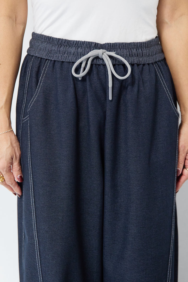 配色ステッチ・カーブデニムパンツ