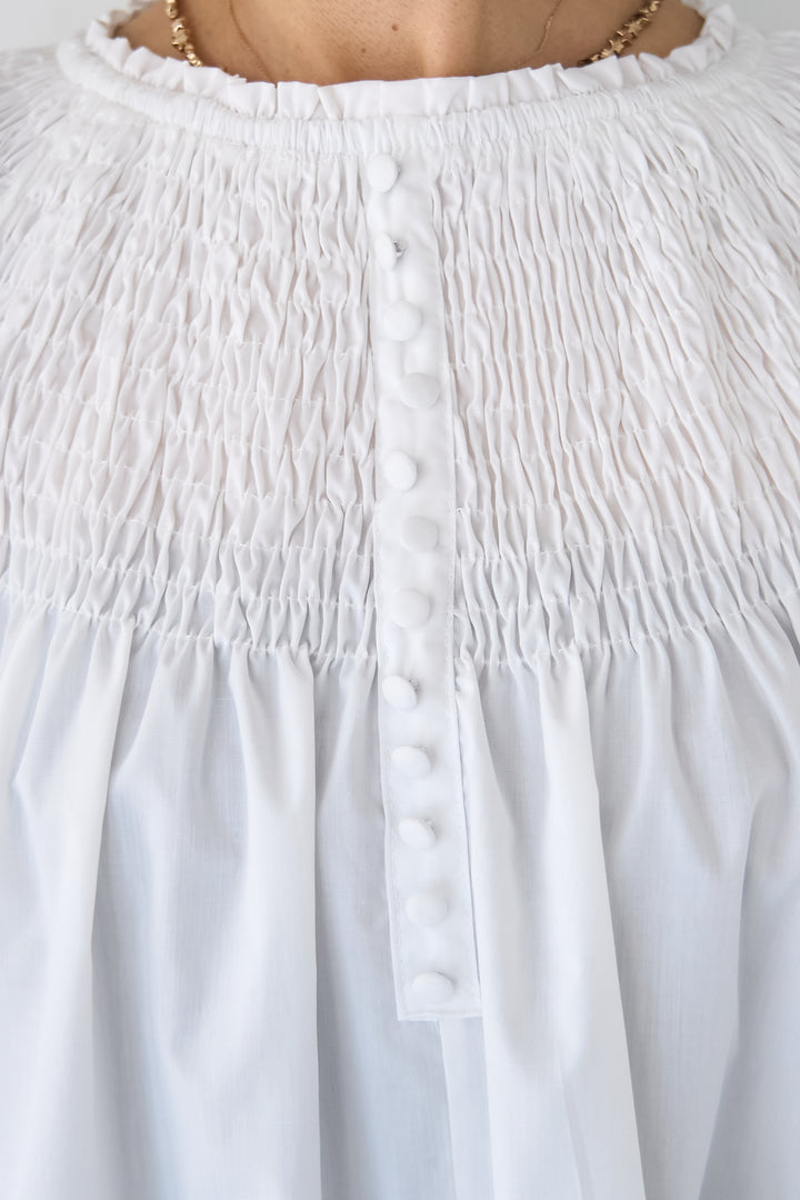 シャーリングネックボリュームブラウス