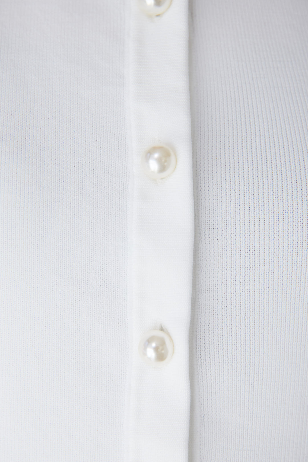 パールボタンペプラムカーディガン